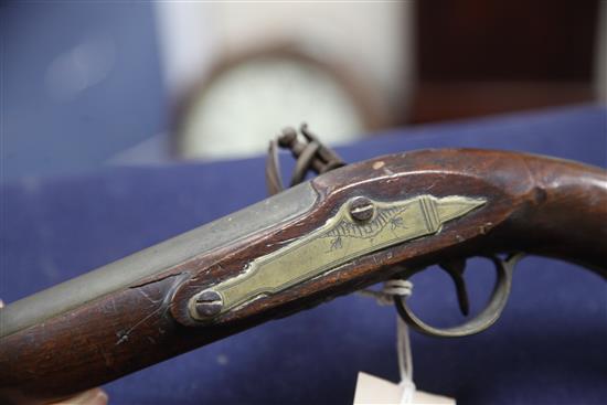 A pair of early 19th century flintlock holster pistols, signed Weston, Lewes, 15in.